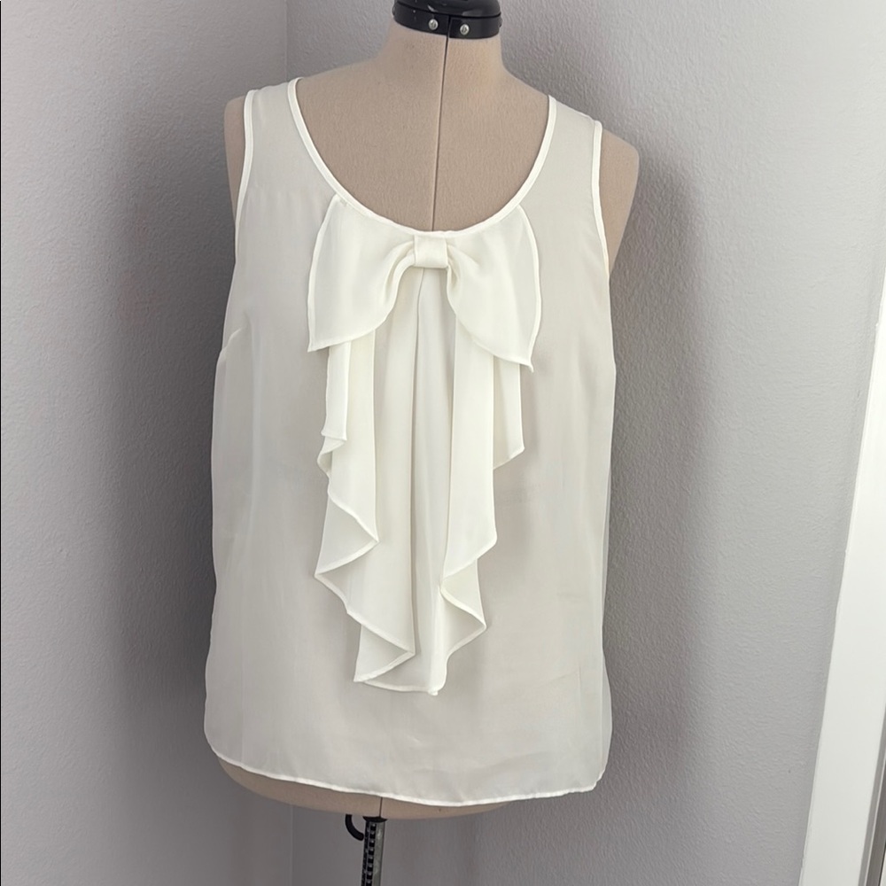 AGB Cream Ruffled Sleeveless Blouse